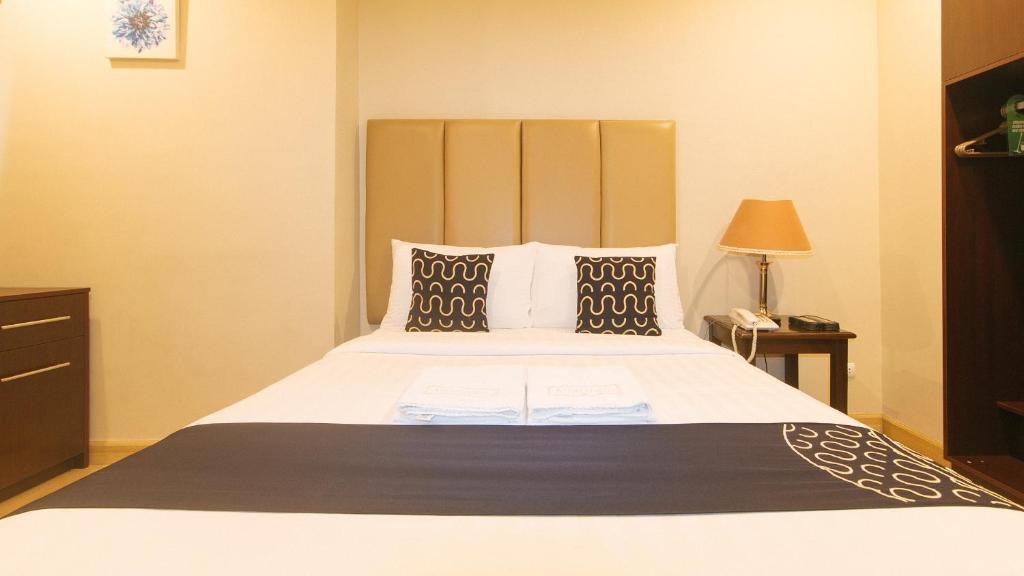 Postel nebo postele na pokoji v ubytování Asrodel Hotel RedPartner