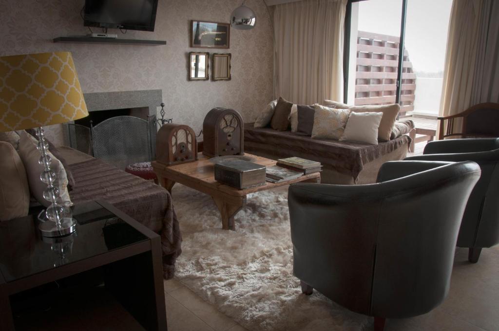 Posezení v ubytování Hotel MAXIM