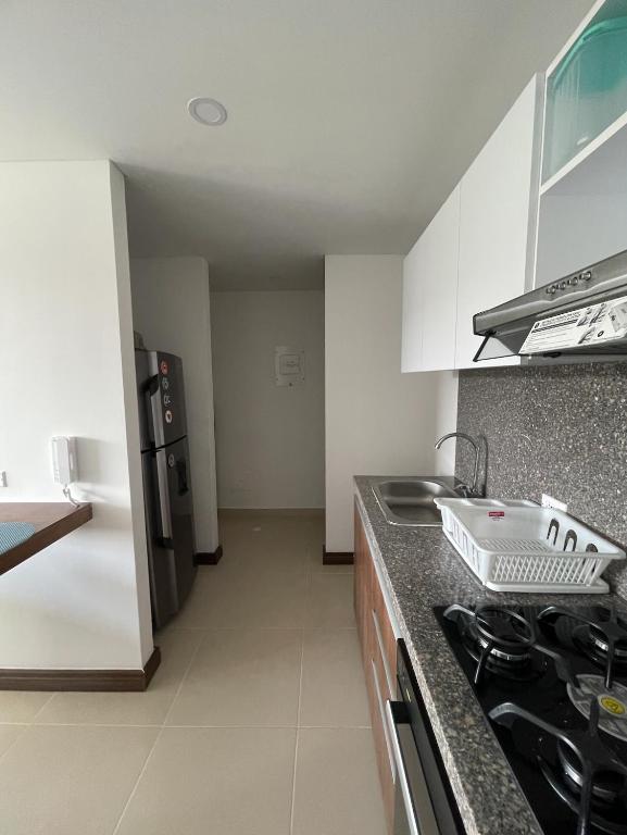 Kuchyň nebo kuchyňský kout v ubytování Espectacular apartamento en Melgar