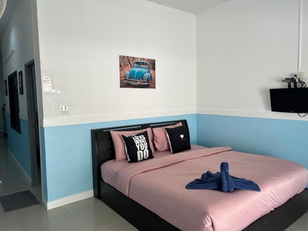Postel nebo postele na pokoji v ubytování Labella samet guesthouse