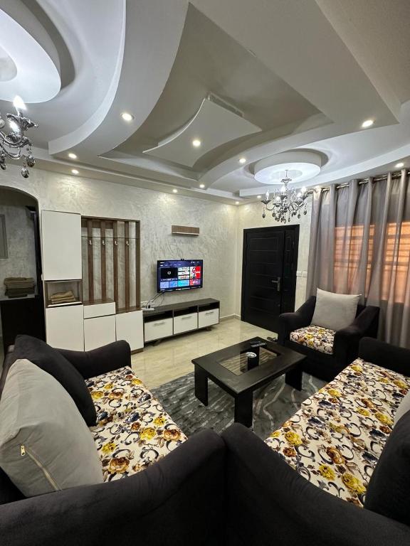 TV a/nebo společenská místnost v ubytování Amro Petra Apartment
