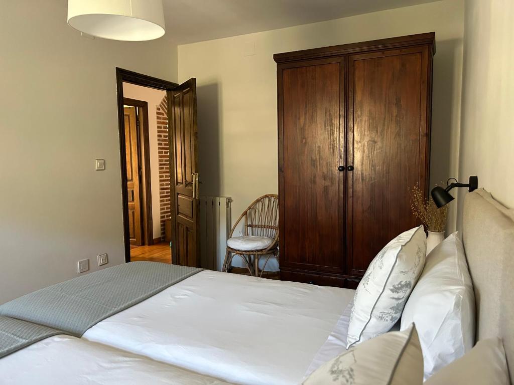 Postel nebo postele na pokoji v ubytování Casa Arenas