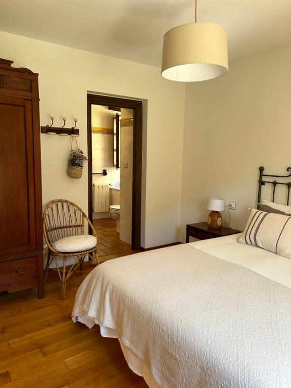 Postel nebo postele na pokoji v ubytování Casa Arenas