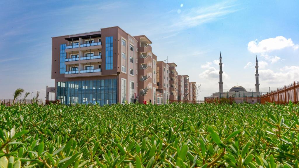 a rendering of a building in a field of grass at WAAFI LA CORNICHE RESIDENCE in Djibouti