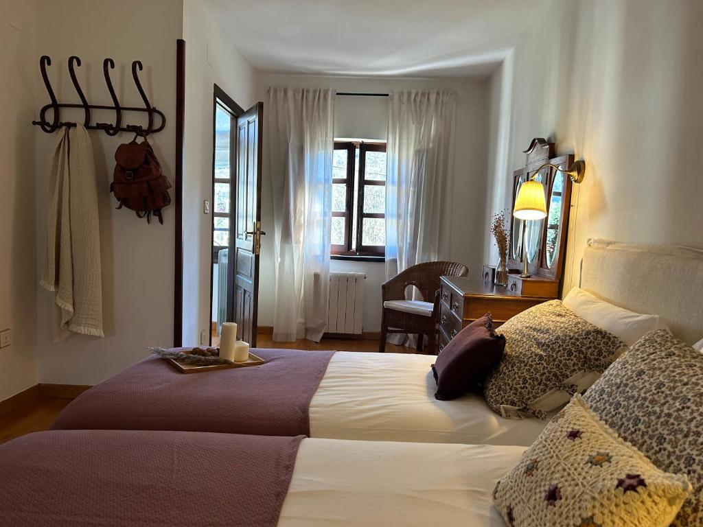 Postel nebo postele na pokoji v ubytování Casa Arenas