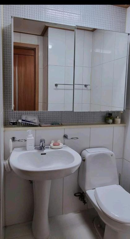 Koupelna v ubytování NK House