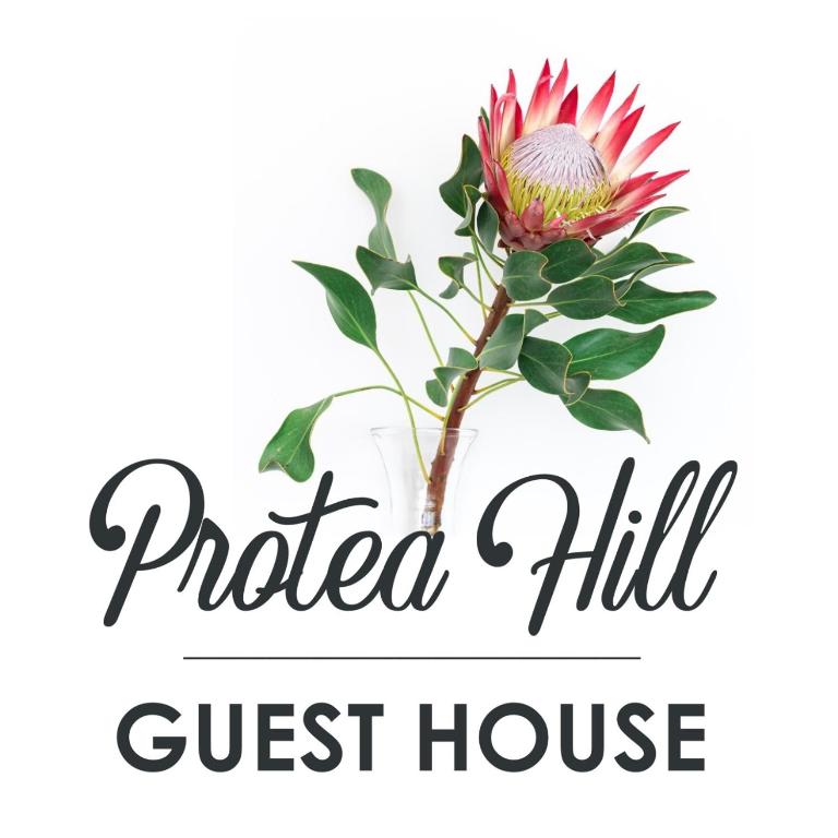 a flower in a vase with the words posted hill guest house at Proteahill Guesthouse in Drummond
