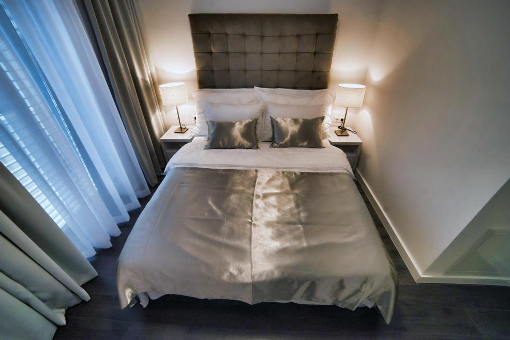 Postel nebo postele na pokoji v ubytování CASA V BENCUN Luxury Apartments