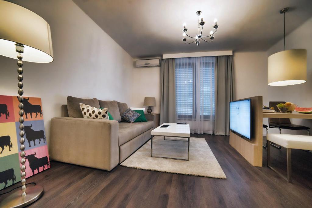 TV a/nebo společenská místnost v ubytování CASA V BENCUN Luxury Apartments