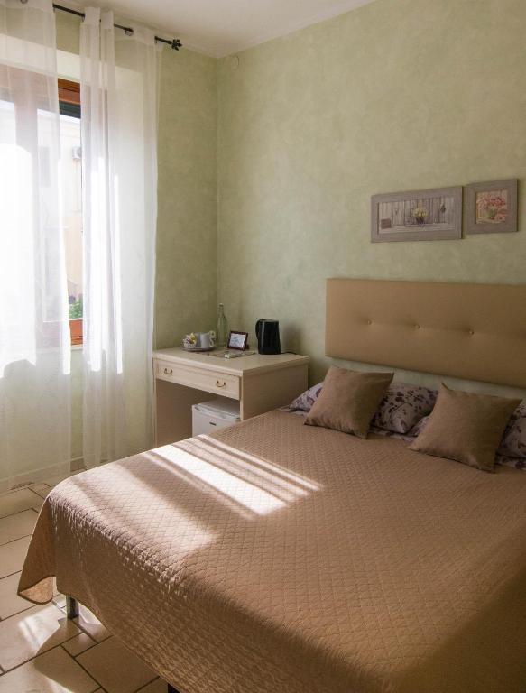 Postel nebo postele na pokoji v ubytování B&B Del Viale