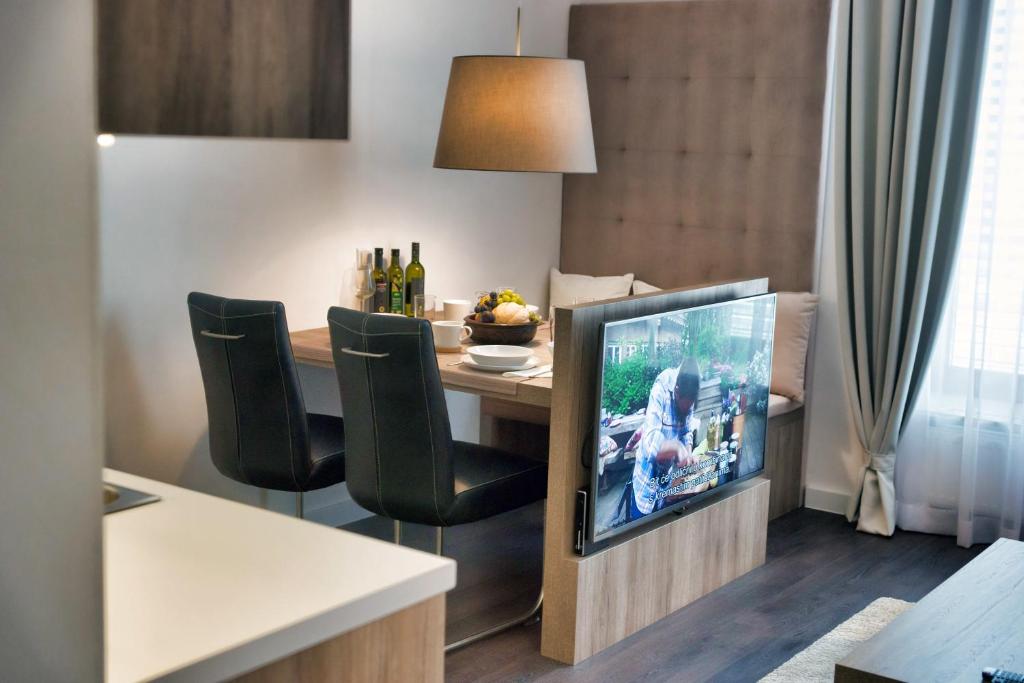 TV a/nebo společenská místnost v ubytování CASA V BENCUN Luxury Apartments