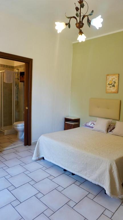 Postel nebo postele na pokoji v ubytování B&B Del Viale