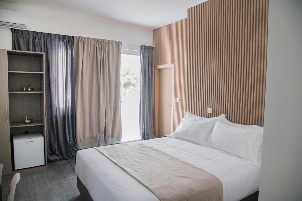 Postel nebo postele na pokoji v ubytování Celia Residence