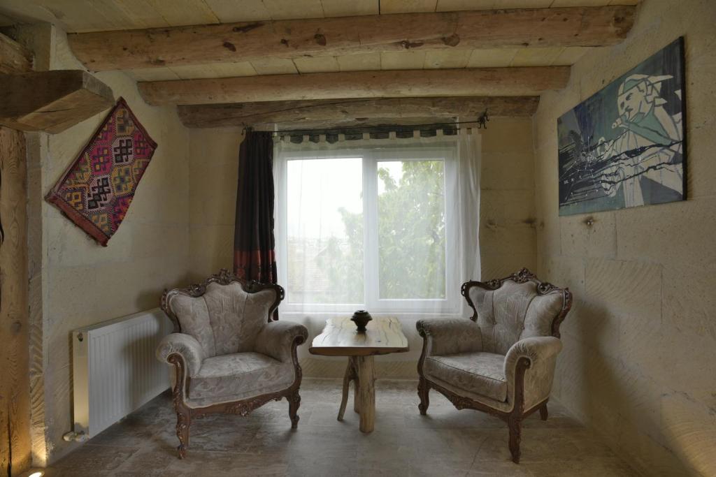 Posezení v ubytování Philosophy Hotel