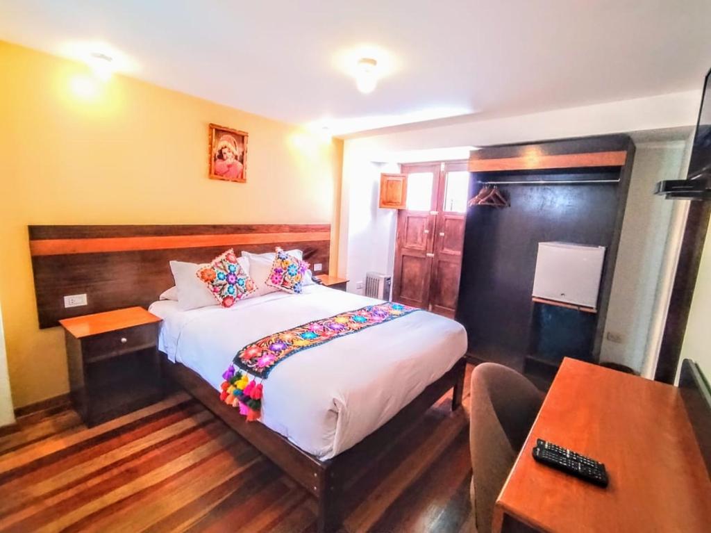 Postel nebo postele na pokoji v ubytování Posada San Blas