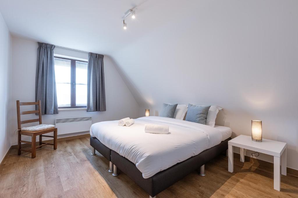 Postel nebo postele na pokoji v ubytování Villa Florentine