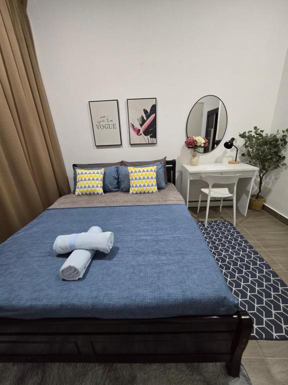 Katil atau katil-katil dalam bilik di Trio Guest House at Troika Residency