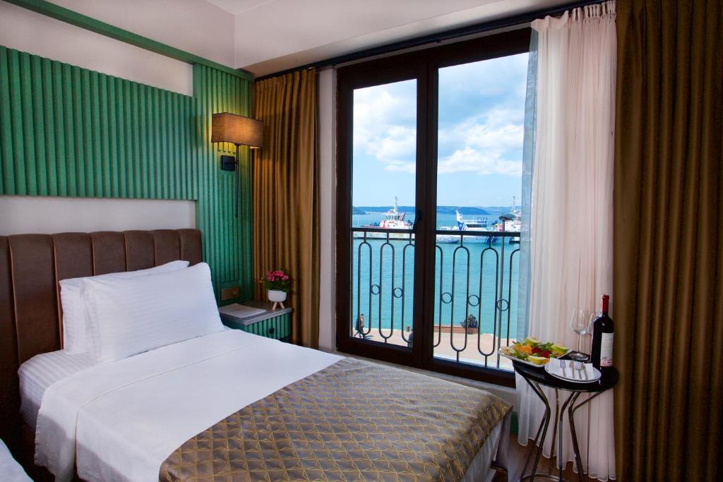 Postel nebo postele na pokoji v ubytování Çanakkale Bosphorus Port Aspen Hotel