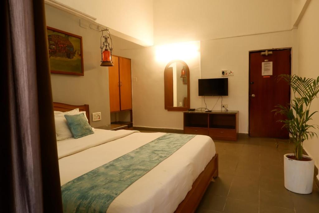 TV a/nebo společenská místnost v ubytování Falcon Resorts by Dia Hotels