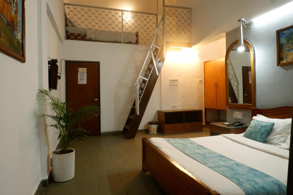 Postel nebo postele na pokoji v ubytování Falcon Resorts by Dia Hotels