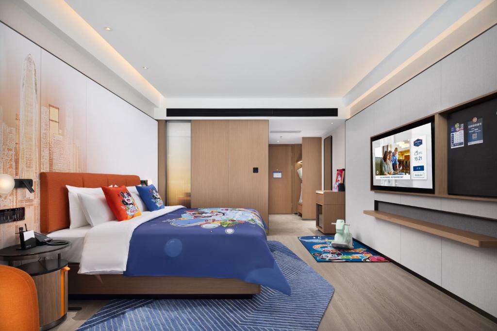 TV a/nebo společenská místnost v ubytování Hampton by Hilton Shenzhen Futian Huaqiangbei