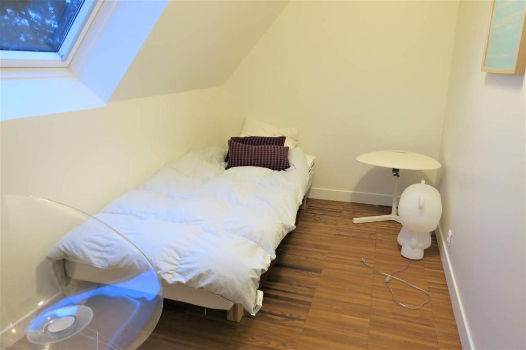 Posteľ alebo postele v izbe v ubytovaní Superbe villa VUE SUR MER, 11 personnes à TREBEURDEN REF-669