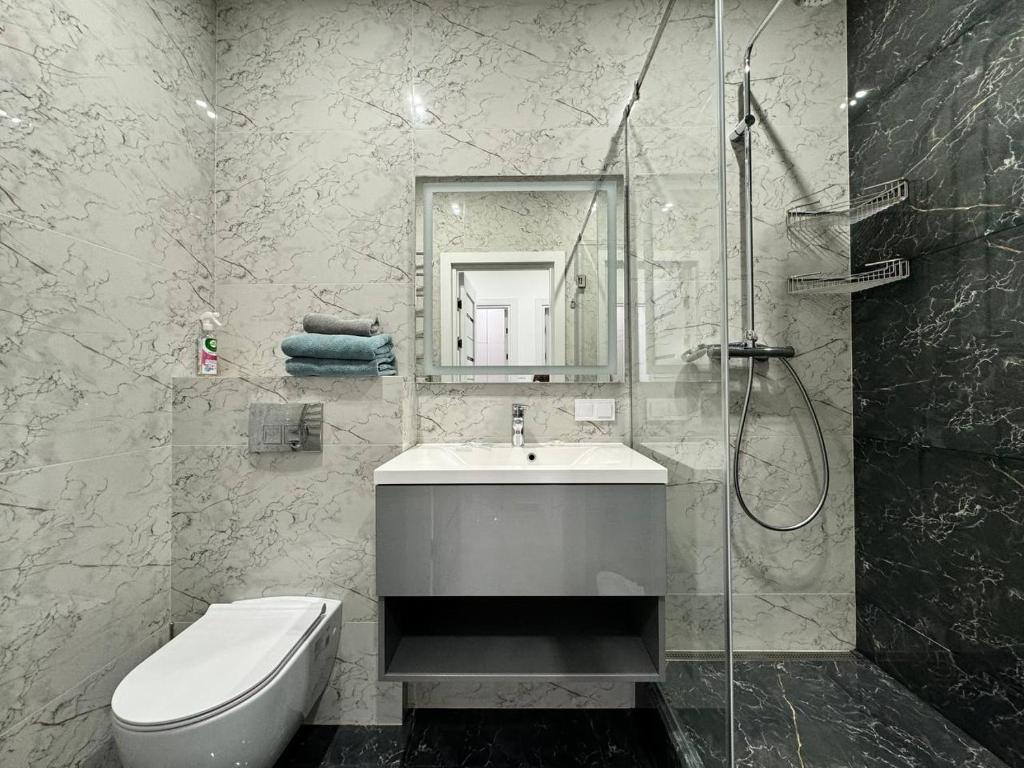 Koupelna v ubytování Arcadia Luxury Apartments