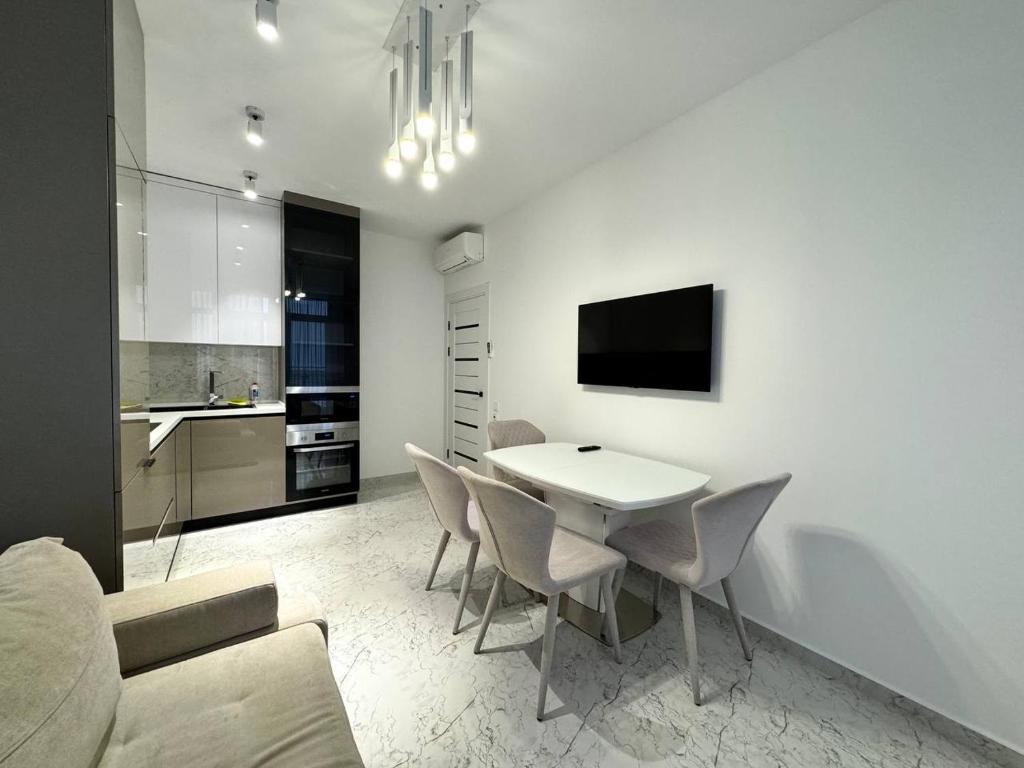 Kuchyň nebo kuchyňský kout v ubytování Arcadia Luxury Apartments