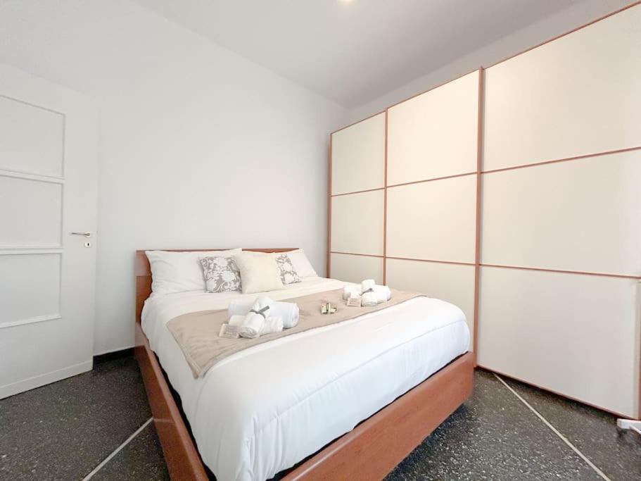 [Suite in Nervi] porticciolo - Stazione10' - WiFi tesisinde bir odada yatak veya yataklar