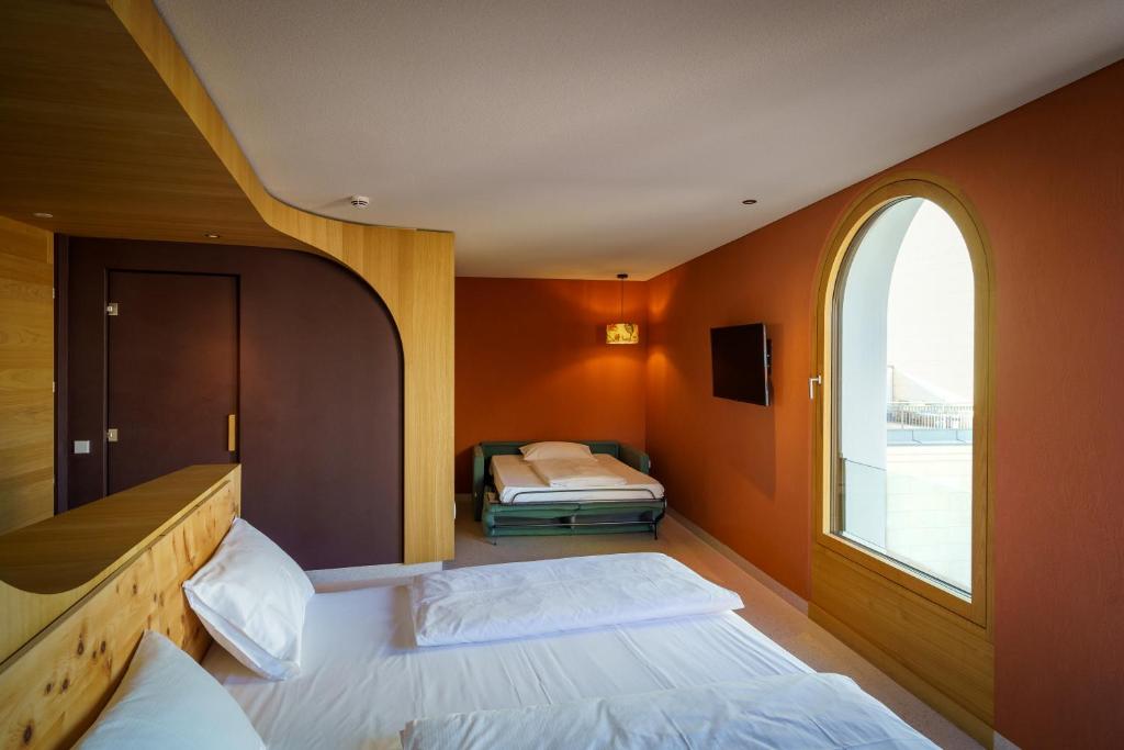Postel nebo postele na pokoji v ubytování Hotel La Briosa