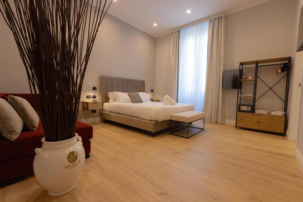 En eller flere senge i et værelse på Relais At Via Veneto
