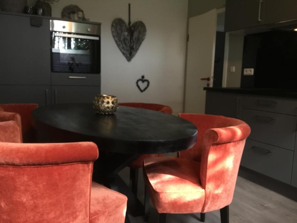 Posezení v ubytování Ferienwohnung Lands Huys