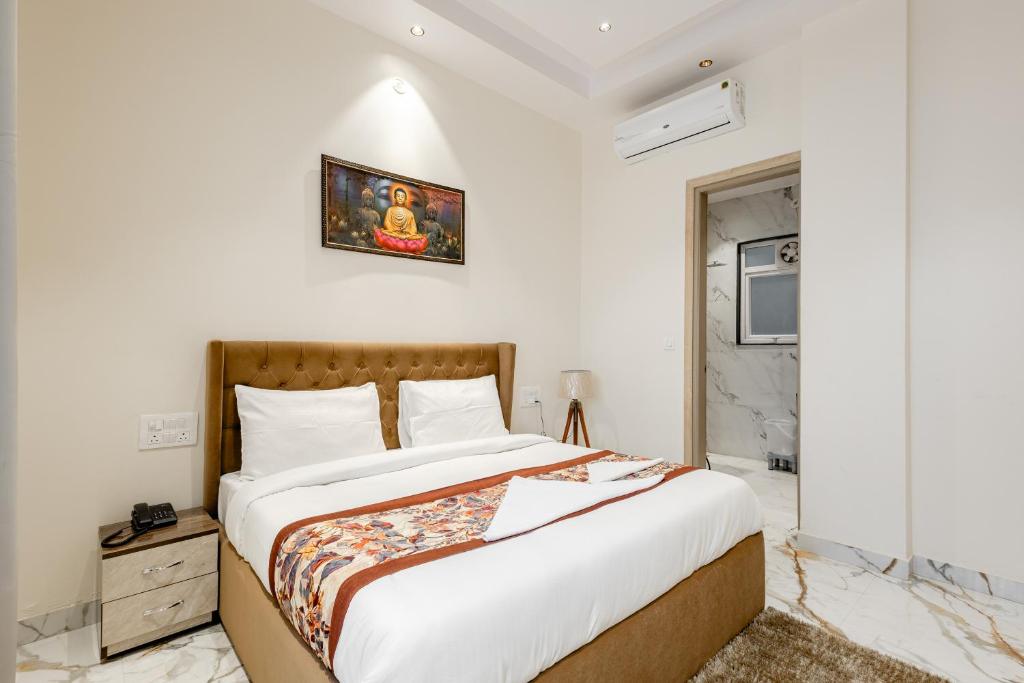 Postel nebo postele na pokoji v ubytování Lime Tree B&B Pari Chowk