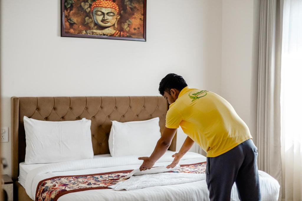 Postel nebo postele na pokoji v ubytování Lime Tree B&B Pari Chowk