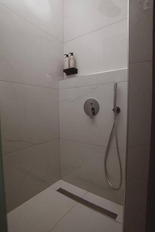 Kúpeľňa v ubytovaní Hotel Hara Ilios Village
