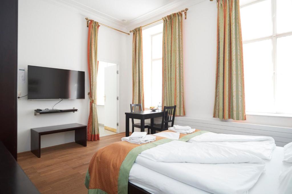 Sjónvarps- og/eða afþreyingartæki á La Scala Apartments