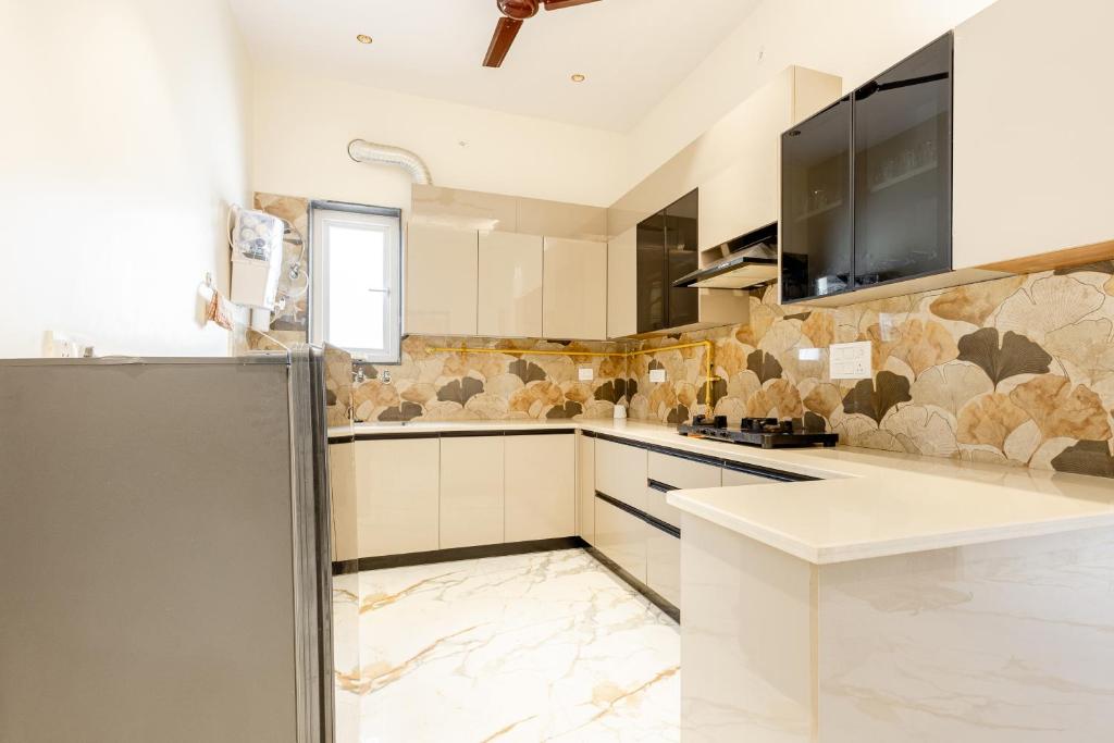 Kuchyň nebo kuchyňský kout v ubytování Lime Tree B&B Pari Chowk