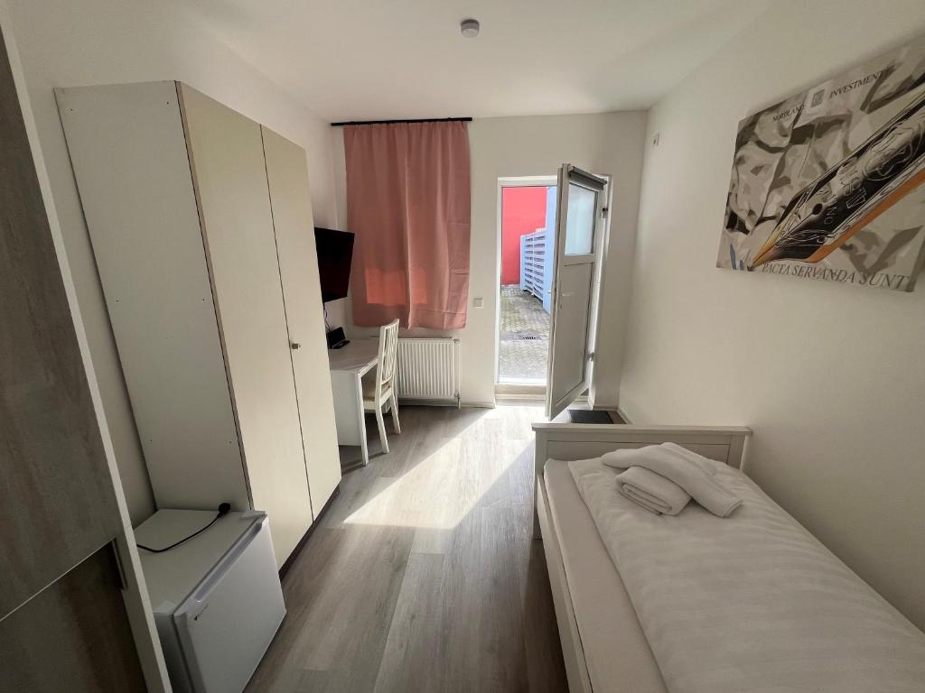 Postel nebo postele na pokoji v ubytování Pension Donau