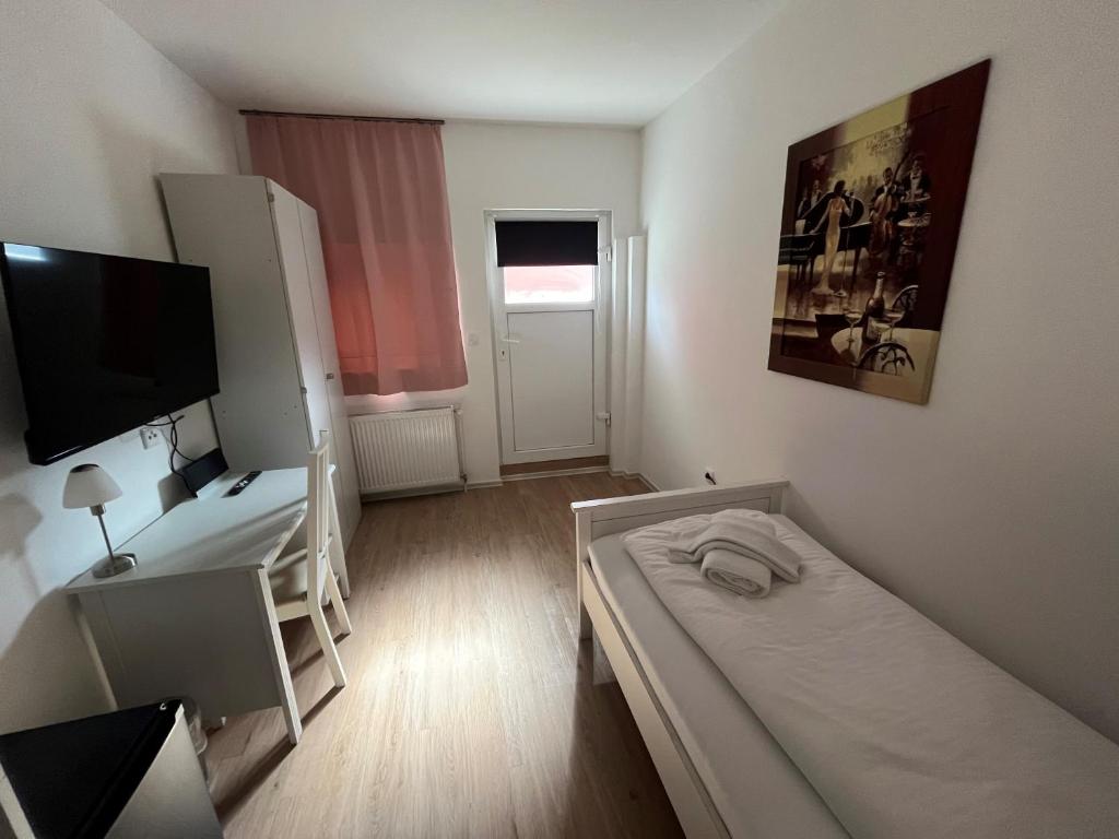 Postel nebo postele na pokoji v ubytování Pension Donau