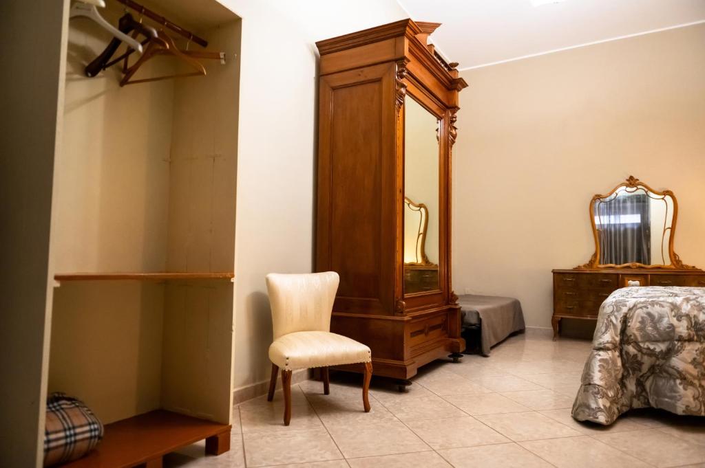 Postel nebo postele na pokoji v ubytování Casa Luca - Siti storici e ottima cucina locale