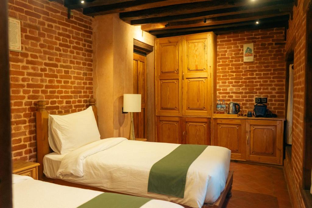Manju Baha Hotel - Chambre Lits Jumeaux