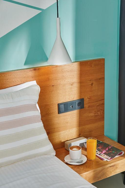 Letto o letti in una camera di Mosaikon