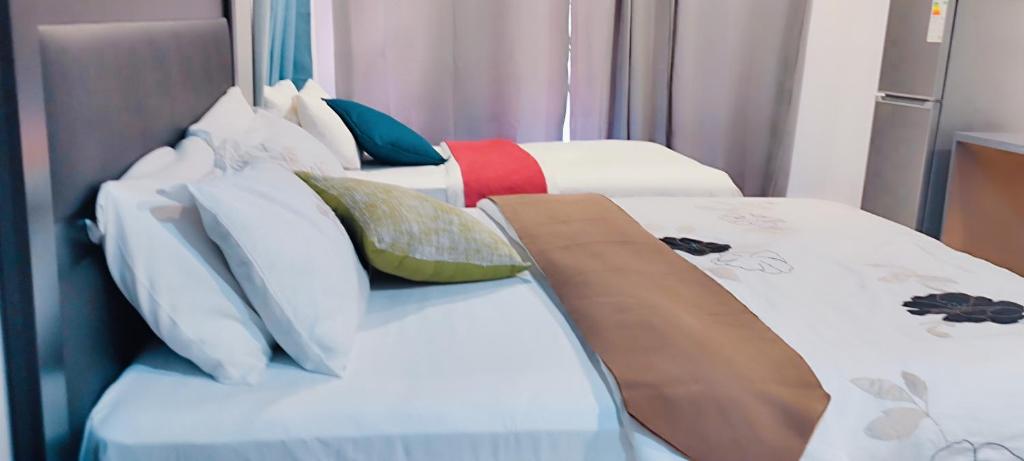 Voodi või voodid majutusasutuse Hilton Bed & Breakfast toas