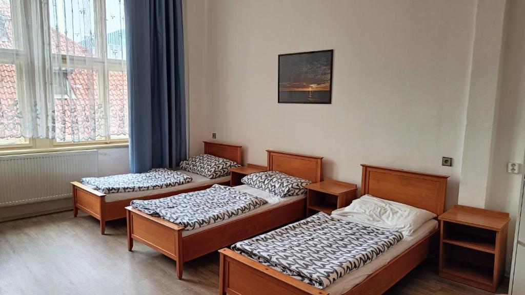 Postel nebo postele na pokoji v ubytování A Plus Hostel - Centrum