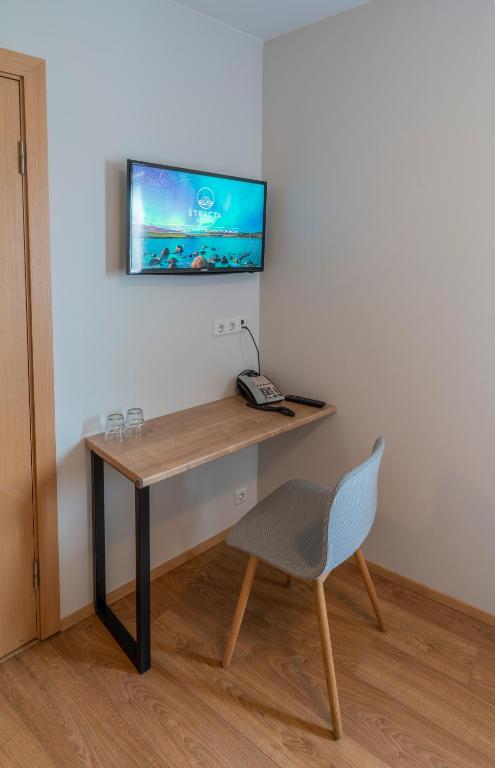 Sjónvarps- og/eða afþreyingartæki á Stracta Hotel