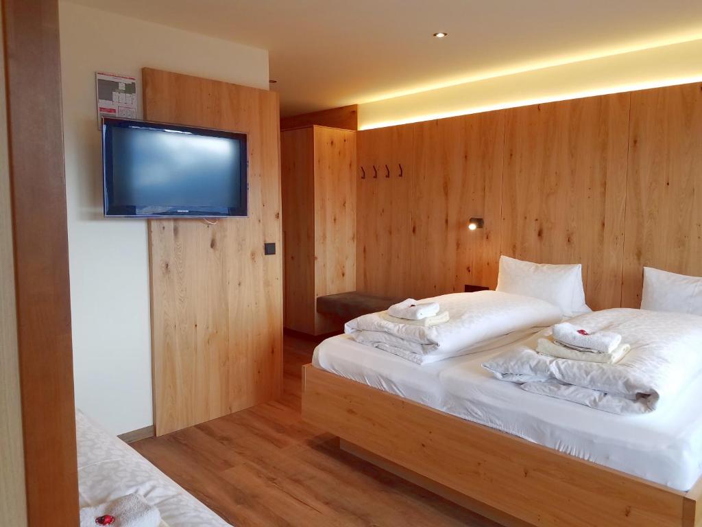 Postel nebo postele na pokoji v ubytování Aparthotel Hohe Brücke