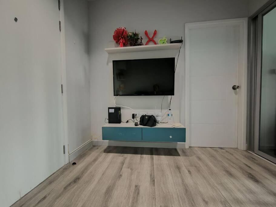 TV a/nebo společenská místnost v ubytování centric sea