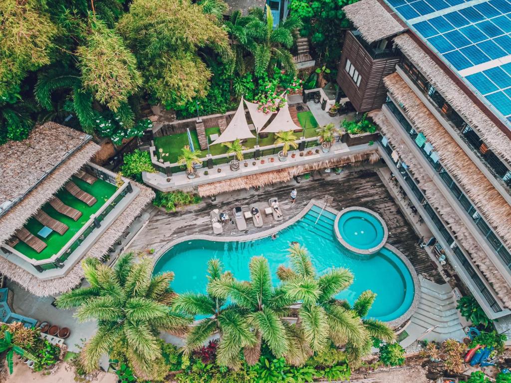 an overhead view of a pool at a resort at Bugana Beach and Dive Resort in Manlocahoc