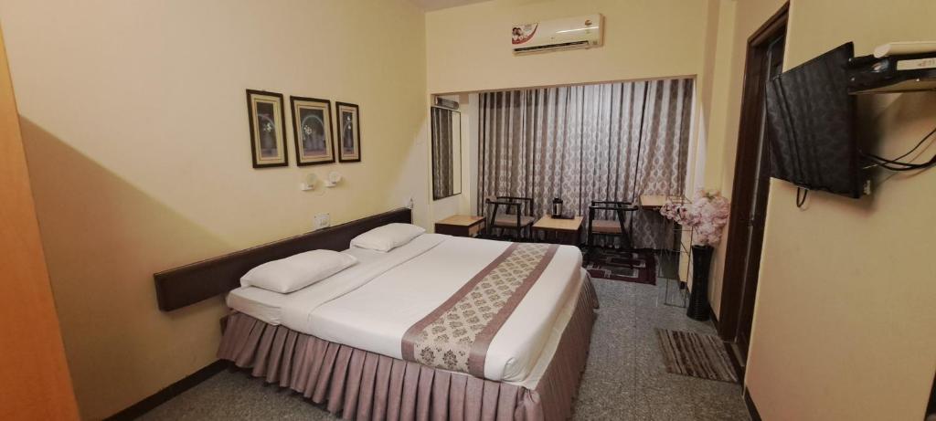 TV a/nebo společenská místnost v ubytování Hotel Swaroop