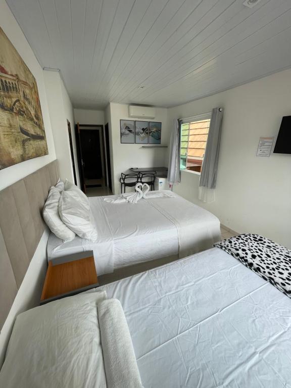 Postel nebo postele na pokoji v ubytování Flat Morro de São Paulo e Casa Blanca